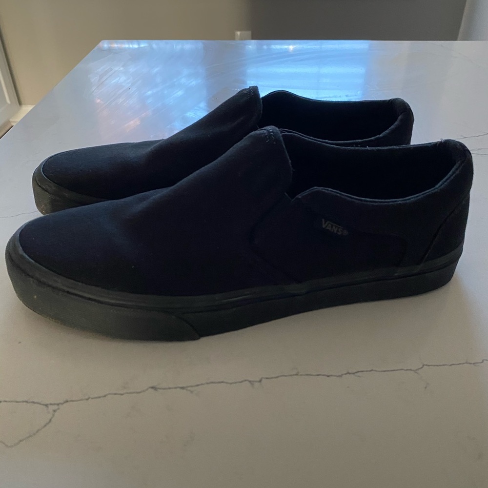 Vans black slip on‘s. Men’s size 9.